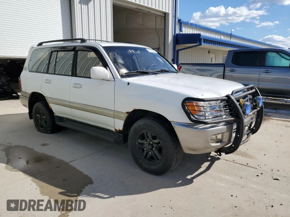 1999 Toyota Land Cruiser with VIN JT3HT05J3X0068111, listed as a Copart auction lot 72815044 with 185,043 mi miles and Clean Title. Bid and sale history available at carsss.com. Image 4.