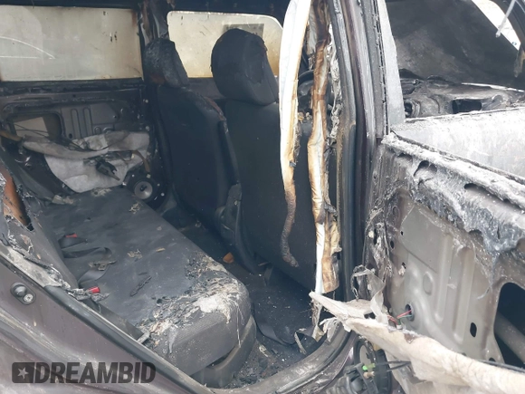 2008 Scion xB z VIN JTLKE50E981040901, wystawiony jako IAAI lot #41569592 z przebiegiem Nie podano mil oraz . Historia ofert i sprzedaży dostępna na DreamBid. Obrazek 8.