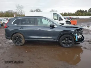 2025 Honda CR-V Sport Touring with VIN 7FARS6H93SE043232, listed as a IAAI auction lot 41679675 with 11,641 mi miles and . Bid and sale history available at DreamBid. Image 14.