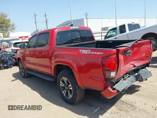 2018 Toyota Tacoma SR5 with VIN 5TFAZ5CN0JX063350, listed as a IAAI auction lot 41829396 with 61,155 mi miles and . Bid and sale history available at DreamBid. Image 3.