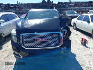 2016 GMC Yukon XL Denali with VIN 1GKS1HKJ5GR435925, listed as a IAAI auction lot 41727259 with 137,098 mi miles. Bid and sale history available at carsss.com. Image 12.