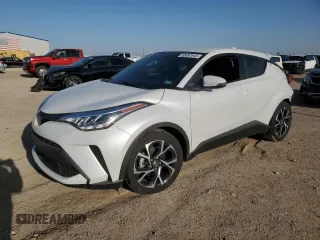 2022 Toyota C-HR XLE z VIN NMTKHMBX5NR145136, wystawiony jako Copart lot #52697445 z przebiegiem 16 607 mil mil oraz Szkoda całkowita • Salvage title. Historia ofert i sprzedaży dostępna na DreamBid. Obrazek 1.