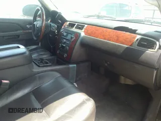 2013 Chevrolet Suburban LT with VIN 1GNSCJE05DR142688, listed as a IAAI auction lot 42214548 with 236,464 mi miles and . Bid and sale history available at DreamBid. Image 5.