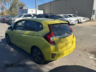 2015 Honda Fit EX-L z VIN 3HGGK5H83FM787047, wystawiony jako Copart lot #77851614 z przebiegiem 270 010 mil mil oraz Czysty tytuł • Clean title. Historia ofert i sprzedaży dostępna na DreamBid. Obrazek 3.
