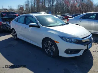 2018 Honda Civic EX-T z VIN 19XFC1F39JE004159, wystawiony jako IAAI lot #41693956 z przebiegiem 50 276 mil mil oraz . Historia ofert i sprzedaży dostępna na DreamBid. Obrazek 1.