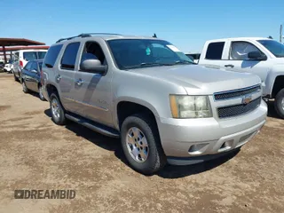2007 Chevrolet Tahoe LT z VIN 1GNFC13067J128676, wystawiony jako IAAI lot #41864151 z przebiegiem 220 418 mil mil oraz . Historia ofert i sprzedaży dostępna na DreamBid. Obrazek 1.