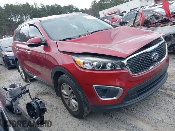 2018 Kia Sorento LX z VIN 5XYPG4A39JG400774, wystawiony jako IAAI lot #41711055 z przebiegiem 56 046 mil mil oraz . Historia ofert i sprzedaży dostępna na DreamBid. Obrazek 13.