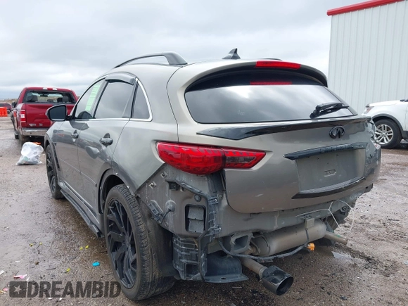 2014 Infiniti QX70 z VIN JN8CS1MU3EM451745, wystawiony jako IAAI lot #42203922 z przebiegiem 144 990 mil mil oraz . Historia ofert i sprzedaży dostępna na DreamBid. Obrazek 3.