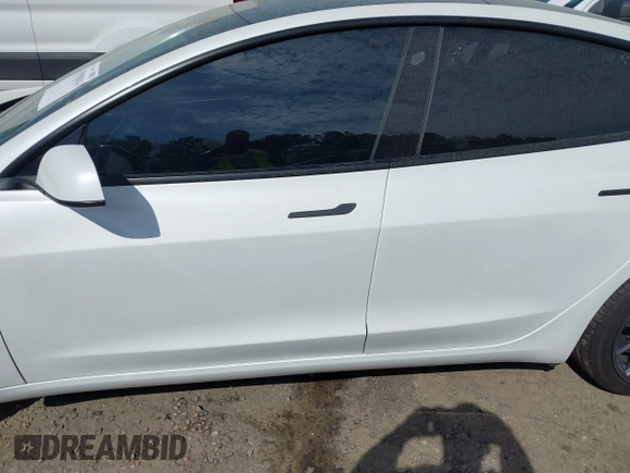2022 Tesla Model 3 with VIN 5YJ3E1EA5NF124148, listed as a IAAI auction lot 41908884 with 45,115 mi miles. Bid and sale history available at carsss.com. Image 15.