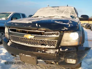 2012 Chevrolet Tahoe LT with VIN 1GNSKBE09CR295291, listed as a IAAI auction lot 41261810 with 133,400 mi miles and . Bid and sale history available at DreamBid. Image 6.