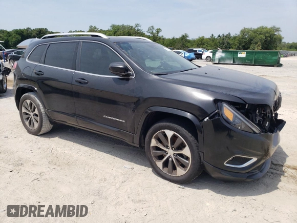 2019 Jeep Cherokee z VIN 1C4PJLJN0KD215834, wystawiony jako Copart lot #57652975 z przebiegiem 127 986 mil mil oraz Czysty tytuł • Clean title. Historia ofert i sprzedaży dostępna na DreamBid. Obrazek 4.