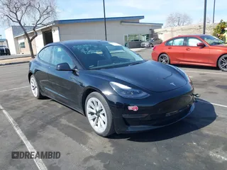 2022 Tesla Model 3 Long Range with VIN 5YJ3E1EB1NF133356, listed as a IAAI auction lot 41568303 with 73,406 mi miles. Bid and sale history available at carsss.com. Image 1.