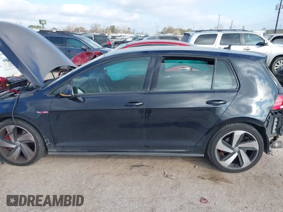 2021 Volkswagen GTI S z VIN 3VW5T7AU6MM010040, wystawiony jako IAAI lot #41503615 z przebiegiem 68 025 mil mil oraz . Historia ofert i sprzedaży dostępna na DreamBid. Obrazek 14.