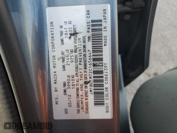 2012 Mazda 3 i Grand Touring with VIN JM1BL1M72C1656647, listed as a Copart auction lot 55590505 with 133,716 mi miles and Salvage title. Bid and sale history available at DreamBid. Image 12.