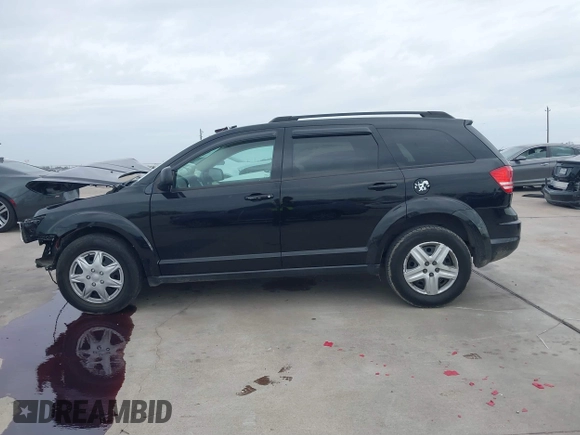 2017 Dodge Journey SE with VIN 3C4PDCAB7HT504032, listed as a IAAI auction lot 41016444 with 116,106 mi miles and . Bid and sale history available at DreamBid. Image 14.