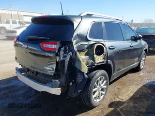 2016 Jeep Cherokee 75th Anniversary with VIN 1C4PJLCB2GW160141, listed as a IAAI auction lot 41748822 with 87,411 mi miles. Bid and sale history available at carsss.com. Image 4.