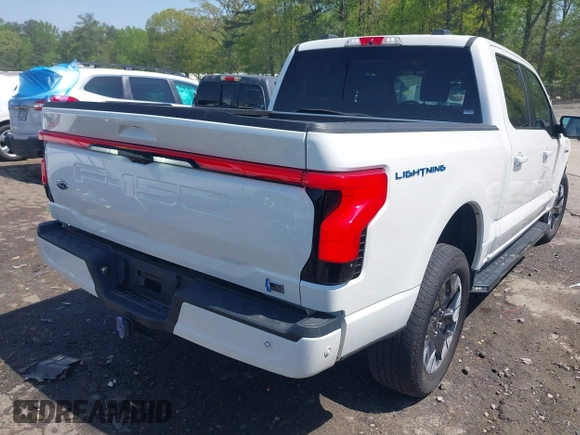 2022 Ford F-150 Lightning Pro z VIN 1FTVW1EL3NWG16227, wystawiony jako IAAI lot #41994584 z przebiegiem 23 341 mil mil oraz . Historia ofert i sprzedaży dostępna na DreamBid. Obrazek 4.