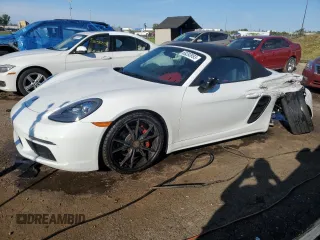 2017 Porsche 718 Boxster z VIN WP0CA2A89HS221297, wystawiony jako Copart lot #68283993 z przebiegiem 9668 mil mil oraz . Historia ofert i sprzedaży dostępna na DreamBid. Obrazek 1.