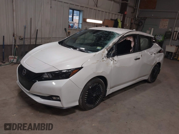 2023 Nissan LEAF SV Plus z VIN 1N4CZ1CV0PC563256, wystawiony jako IAAI lot #41138436 z przebiegiem 24 399 mil mil oraz . Historia ofert i sprzedaży dostępna na DreamBid. Obrazek 2.