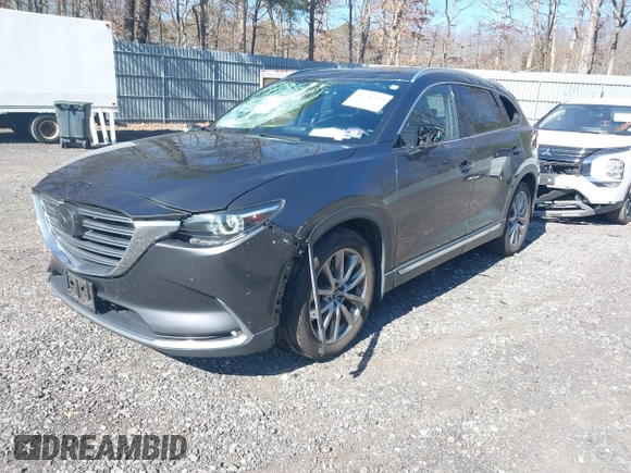 2019 Mazda CX-9 Grand Touring with VIN JM3TCBDY3K0307964, listed as a IAAI auction lot 41706594 with 170,596 mi miles and . Bid and sale history available at DreamBid. Image 18.