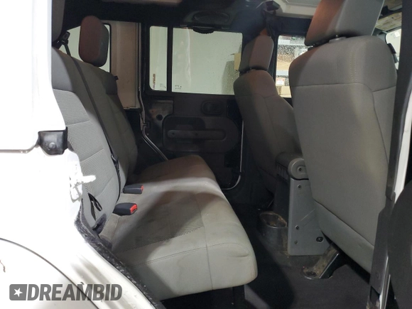 2008 Jeep Wrangler Unlimited Sahara с VIN 1J8GA59108L514034, выставлен на аукционе Copart как лот 58812215 с пробегом 191 800 миль миль и Списание • Salvage title. История ставок и продаж доступна на DreamBid. Изображение 11.