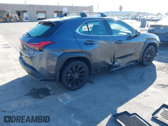 2022 Lexus UX with VIN JTHX3JBH6N2056436, listed as a IAAI auction lot 41856541 with 12,815 mi miles. Bid and sale history available at carsss.com. Image 4.