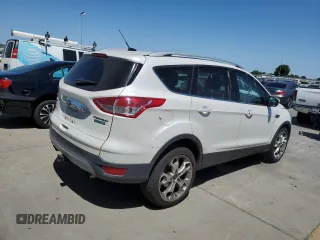 2015 Ford Escape Titanium with VIN 1FMCU0J95FUA92671, listed as a Copart auction lot 63930755 with 191,209 mi miles and Clean title. Bid and sale history available at DreamBid. Image 3.