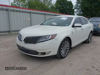 2013 Lincoln MKS with VIN 1LNHL9DKXDG604710, listed as a IAAI auction lot 42001875 with 117,724 mi miles and . Bid and sale history available at DreamBid. Image 2.