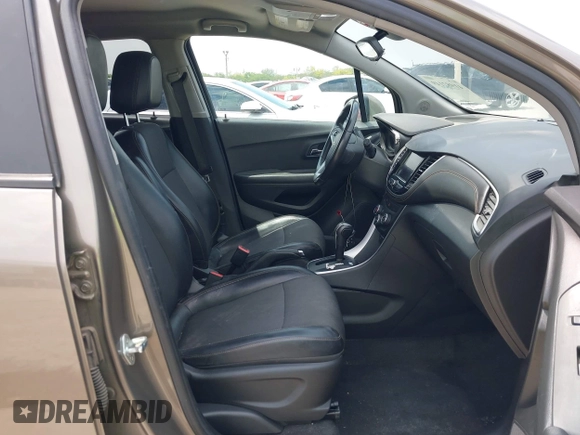 2021 Chevrolet Trax LT with VIN KL7CJLSBXMB359468, listed as a IAAI auction lot 41982149 with 199,685 mi miles and . Bid and sale history available at DreamBid. Image 5.