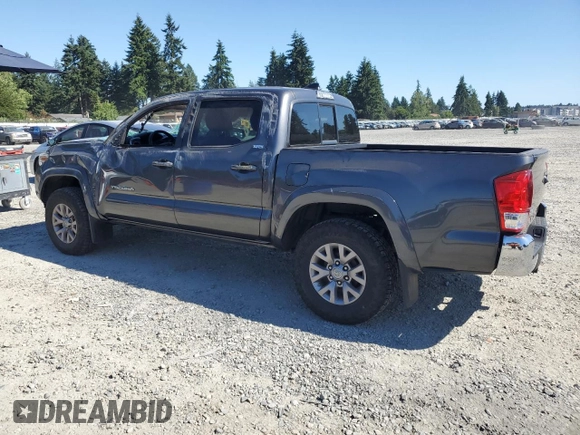 2017 Toyota Tacoma SR5 with VIN 3TMCZ5ANXHM052092, listed as a Copart auction lot 64898135 with 95,743 mi miles and Salvage title. Bid and sale history available at DreamBid. Image 2.