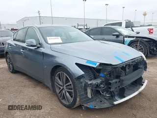2014 Infiniti Q50 with VIN JN1BV7APXEM689997, listed as a IAAI auction lot 41614583 with 138,450 mi miles. Bid and sale history available at carsss.com. Image 1.