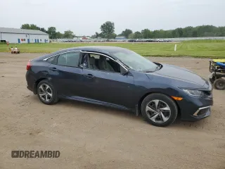 2020 Honda Civic LX with VIN 19XFC2F69LE025564, listed as a Copart auction lot 60811565 with 12,480 mi miles and Salvage title. Bid and sale history available at DreamBid. Image 4.