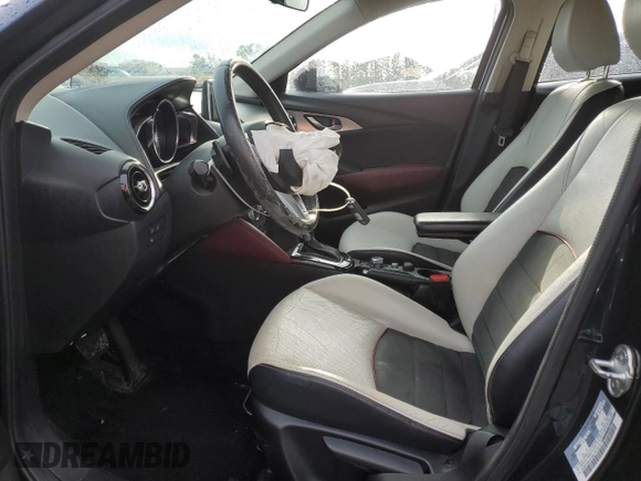 2017 Mazda CX-3 Grand Touring z VIN JM1DKFD75H0141048, wystawiony jako Copart lot #55752185 z przebiegiem 89 960 mil mil oraz Szkody całkowita. Historia ofert i sprzedaży dostępna na DreamBid. Obrazek 7.