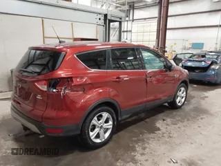 2016 Ford Escape SE with VIN 1FMCU9G95GUC45479, listed as a IAAI auction lot 41517704 with 149,426 mi miles. Bid and sale history available at carsss.com. Image 4.