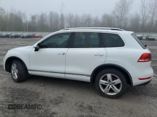 2012 Volkswagen Touareg Sport with VIN WVGEF9BP2CD010668, listed as a Copart auction lot 55306485 with 166,255 mi miles and Clean Title. Bid and sale history available at DreamBid. Image 2.