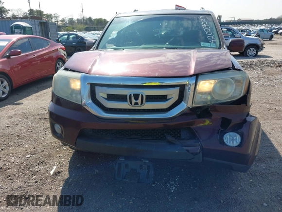 2011 Honda Pilot EX-L with VIN 5FNYF4H58BB060797, listed as a IAAI auction lot 42027084 with 175,466 mi miles. Bid and sale history available at carsss.com. Image 12.