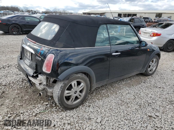 2005 MINI Convertible with VIN WMWRF33485TG11549, listed as a Copart auction lot 87285984 with 58,934 mi miles and Salvage title. Bid and sale history available at DreamBid. Image 3.