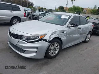 2016 Kia Optima LX with VIN 5XXGT4L34GG023812, listed as a IAAI auction lot 42034160 with 96,720 mi miles and . Bid and sale history available at DreamBid. Image 17.