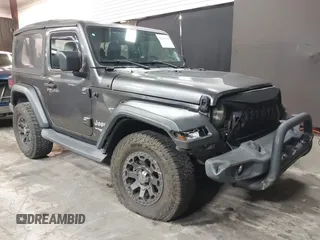 2021 Jeep Wrangler Sport S with VIN 1C4HJXAG2MW502452, listed as a IAAI auction lot 42031159 with 87,952 mi miles and . Bid and sale history available at DreamBid. Image 1.