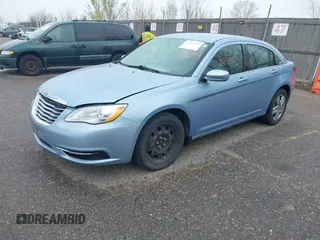 2014 Chrysler 200 LX with VIN 1C3CCBAB1EN205387, listed as a IAAI auction lot 41963185 with 136,782 mi miles. Bid and sale history available at carsss.com. Image 2.