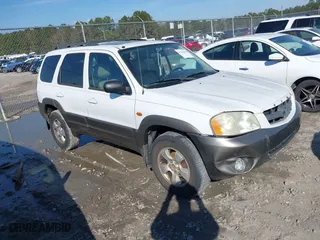 2004 Mazda Tribute ES with VIN 4F2CZ06164KM12579, listed as a IAAI auction lot 41654646 with 208,120 mi miles. Bid and sale history available at carsss.com. Image 1.