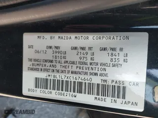 2012 Mazda Mazda3 i Touring with VIN JM1BL1L7XC1674640, listed as a IAAI auction lot 41508549 with 117,088 mi miles. Bid and sale history available at carsss.com. Image 9.