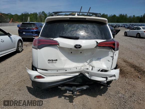 2018 Toyota RAV4 LE with VIN JTMBFREV4JJ720011, listed as a Copart auction lot 54916955 with 135,717 mi miles and Salvage Title. Bid and sale history available at carsss.com. Image 6.