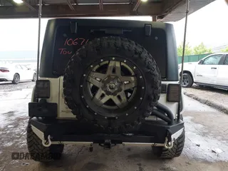 2012 Jeep Wrangler Unlimited Sport с VIN 1C4BJWDG8CL183831, выставлен на аукционе IAAI как лот 42343612 с пробегом 166 847 миль миль и . История ставок и продаж доступна на DreamBid. Изображение 17.
