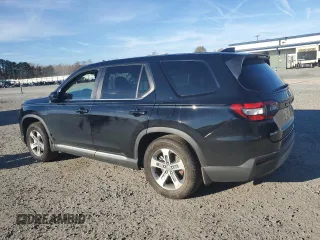 2025 Honda Pilot EX-L with VIN 5FNYG2H48SB006313, listed as a Copart auction lot 82039054 with 10,402 mi miles and Salvage Title. Bid and sale history available at carsss.com. Image 2.