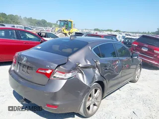 2014 Acura ILX Technology with VIN 19VDE1F73EE013345, listed as a IAAI auction lot 40193022 with 102,265 mi miles and . Bid and sale history available at DreamBid. Image 4.