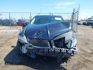 2014 Lincoln MKT EcoBoost z VIN 2LMHJ5ATXEBL57360, wystawiony jako IAAI lot #41976182 z przebiegiem 126 676 mil mil oraz . Historia ofert i sprzedaży dostępna na DreamBid. Obrazek 13.
