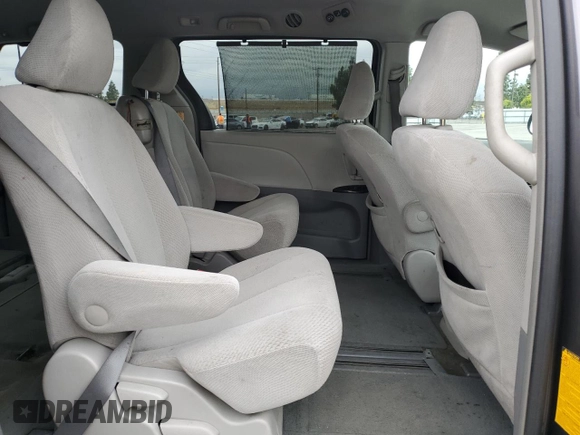 2012 Toyota Sienna LE AAS с VIN 5TDKK3DC8CS241590, выставлен на аукционе Copart как лот 53308815 с пробегом 141 292 миль миль и Списание • Salvage title. История ставок и продаж доступна на DreamBid. Изображение 12.