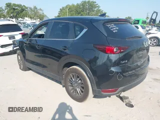 2020 Mazda CX-5 Touring with VIN JM3KFACM2L0770241, listed as a IAAI auction lot 42186952 with 41,590 mi miles and . Bid and sale history available at DreamBid. Image 3.