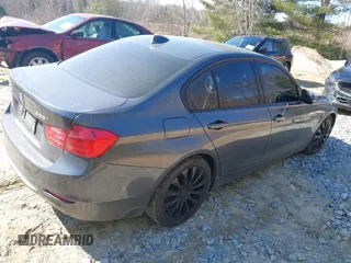 2013 BMW 3 Series 328i xDrive with VIN WBA3B5C56DF594444, listed as a IAAI auction lot 41776495 with 150,434 mi miles. Bid and sale history available at carsss.com. Image 4.